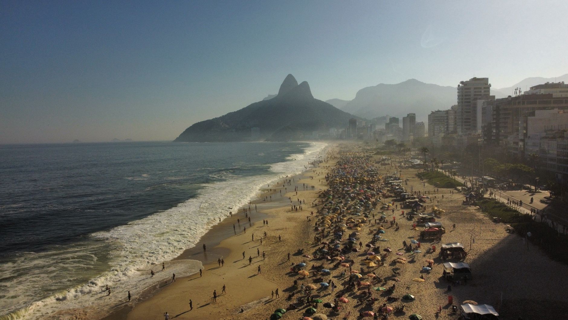 Busy beach in Fortaleza during peak season