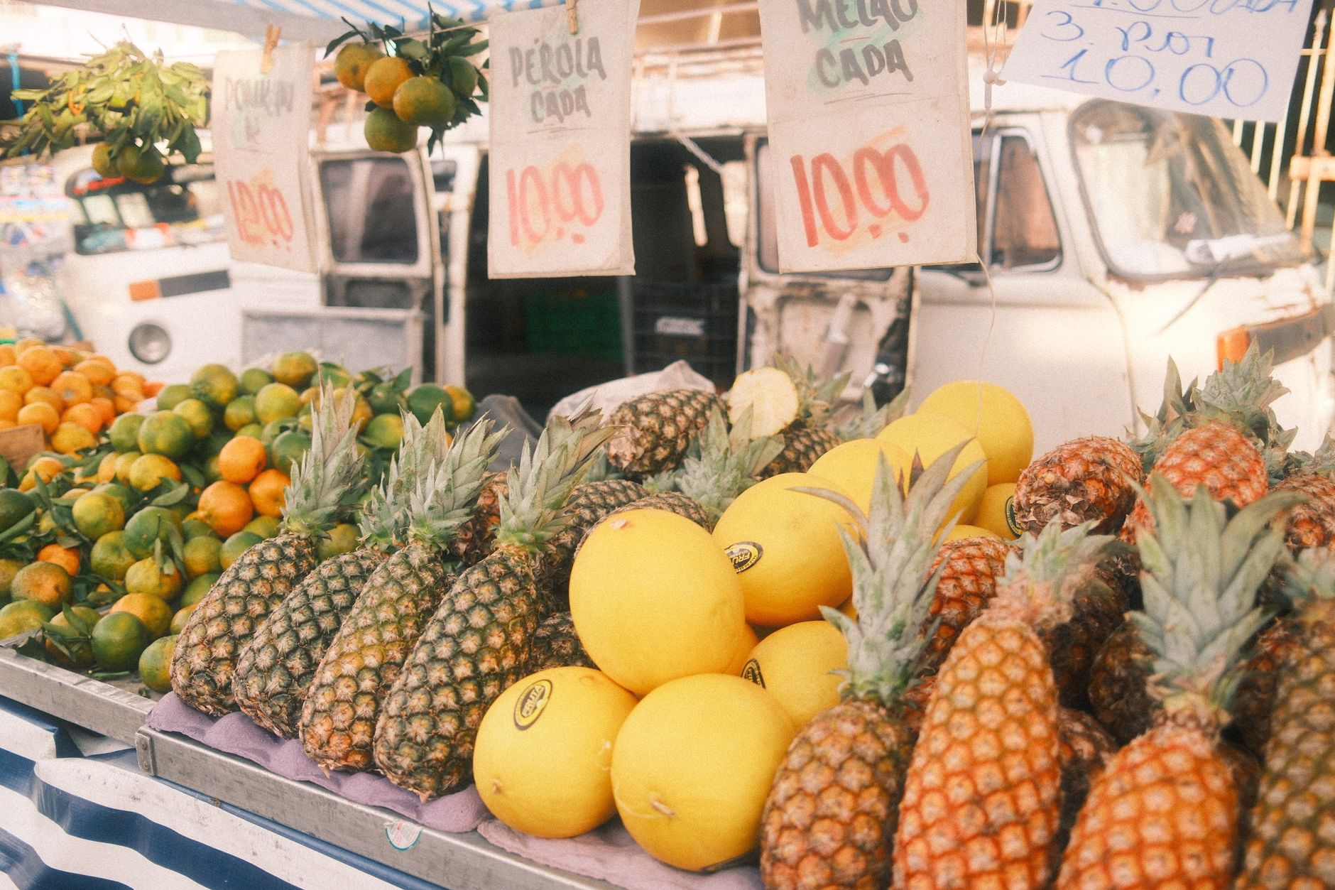 Local market with fruit stalls and fresh produce